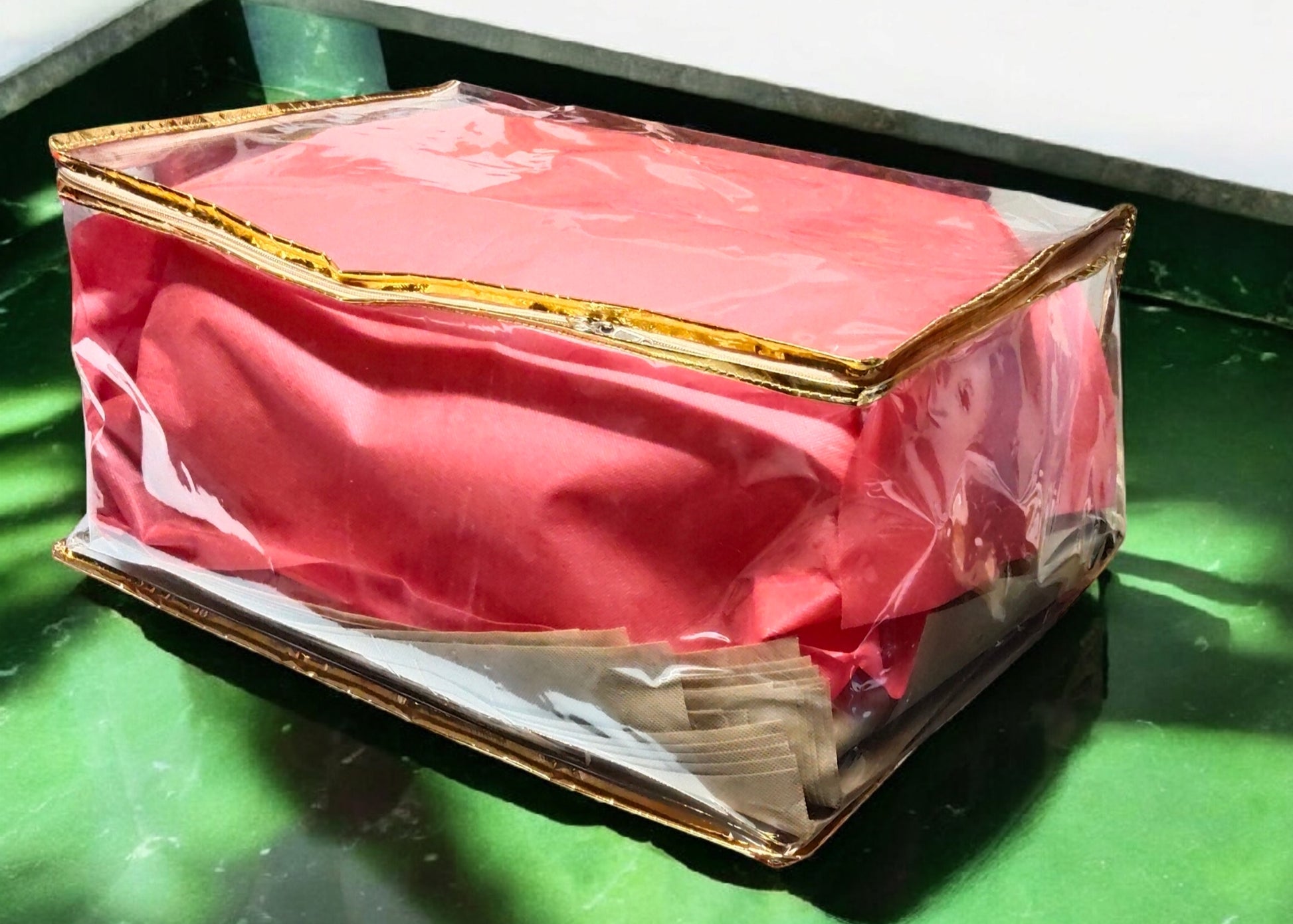 Premium chaniya and gown cover with transparent PVC and golden zipper finish